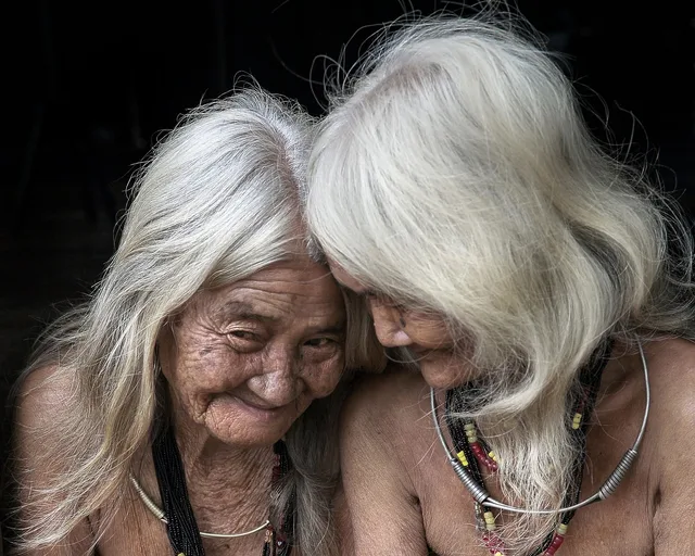 woman, white hair, traditional, portrait, granny, elderly, white hair, white hair, white hair, white hair, white hair, elderly, elderly, elderly. Indigenous language localization in Canada, protocols and project partners