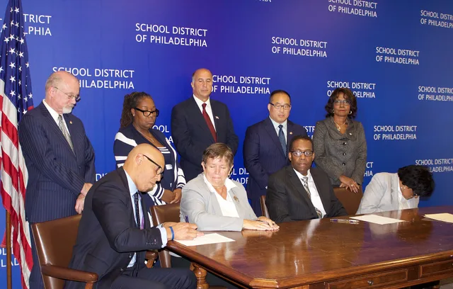 Signing of an intergovernmental agreement between the School District of Philadelphia, the School Reform Commission and Philadelphia City Council held on October 7, 2015 at School District Headquarters. (l. to r. seated) School District Superintendent William Hite, School Reform Commission Chair Mar. Nine translation agency contract clauses and what each has to settle